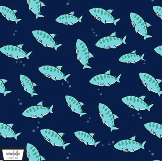 Dangerous Water Fabric from the Nautilus Collection by Michael Miller Fabrics. Navy fabric with cute teal sharks.