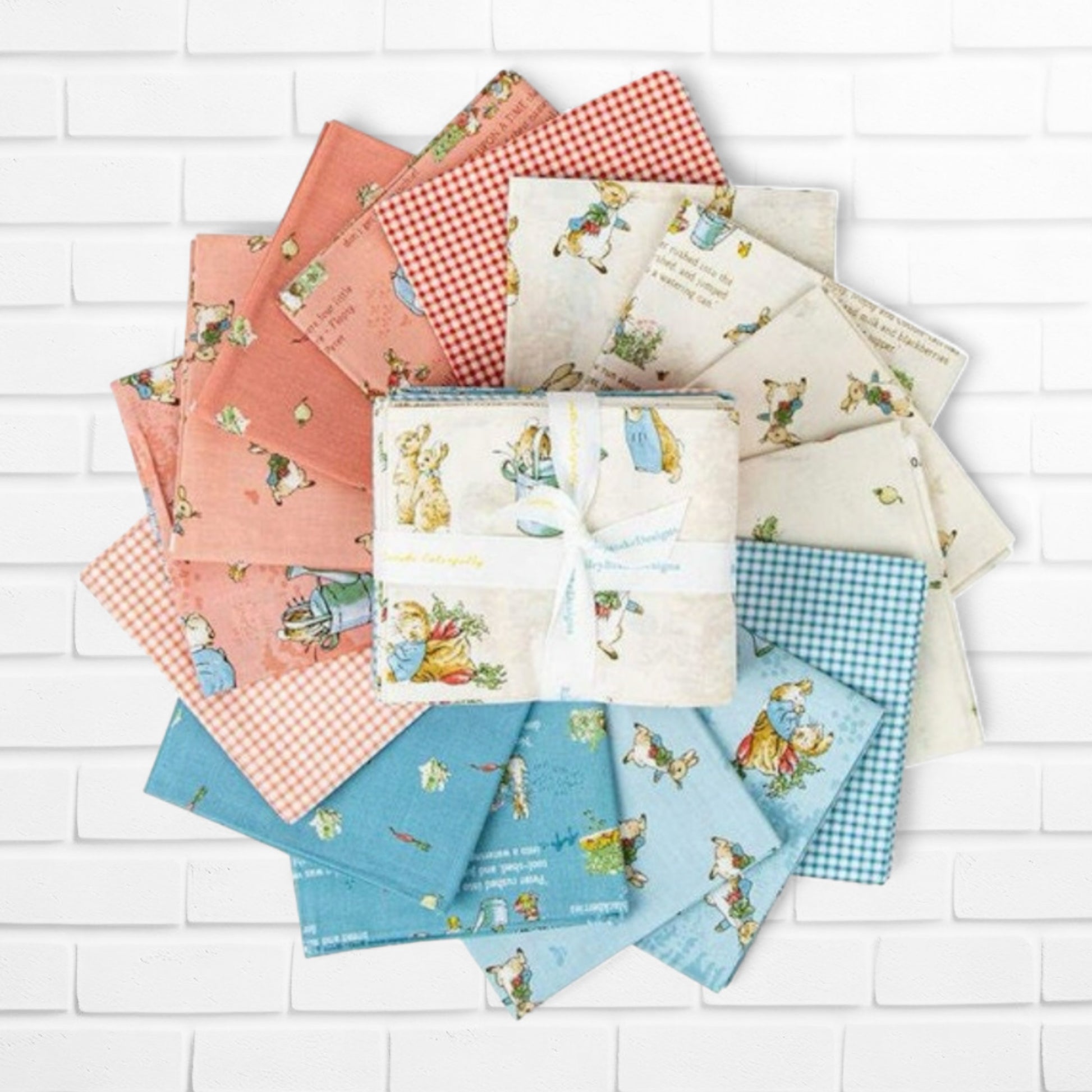 The Tale of Peter Rabbit FQ Bundle - Riley Blake Designs - 15 Fat Quarters featuring the characters from the celoved children's tale, ginghams and coordinating fabrics. 100 cotton, digitally printed.